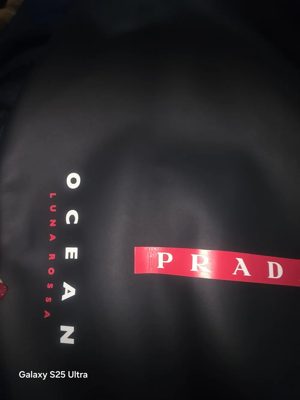 Prada Navy Duffel Backpack with Red Accent